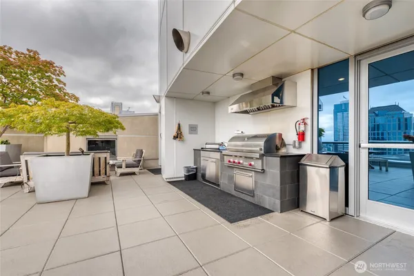 a kitchen with stainless steel appliances granite countertop a sink and a counter