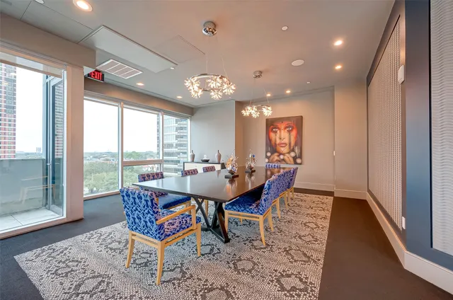 a view of a house with backyard porch and sitting area