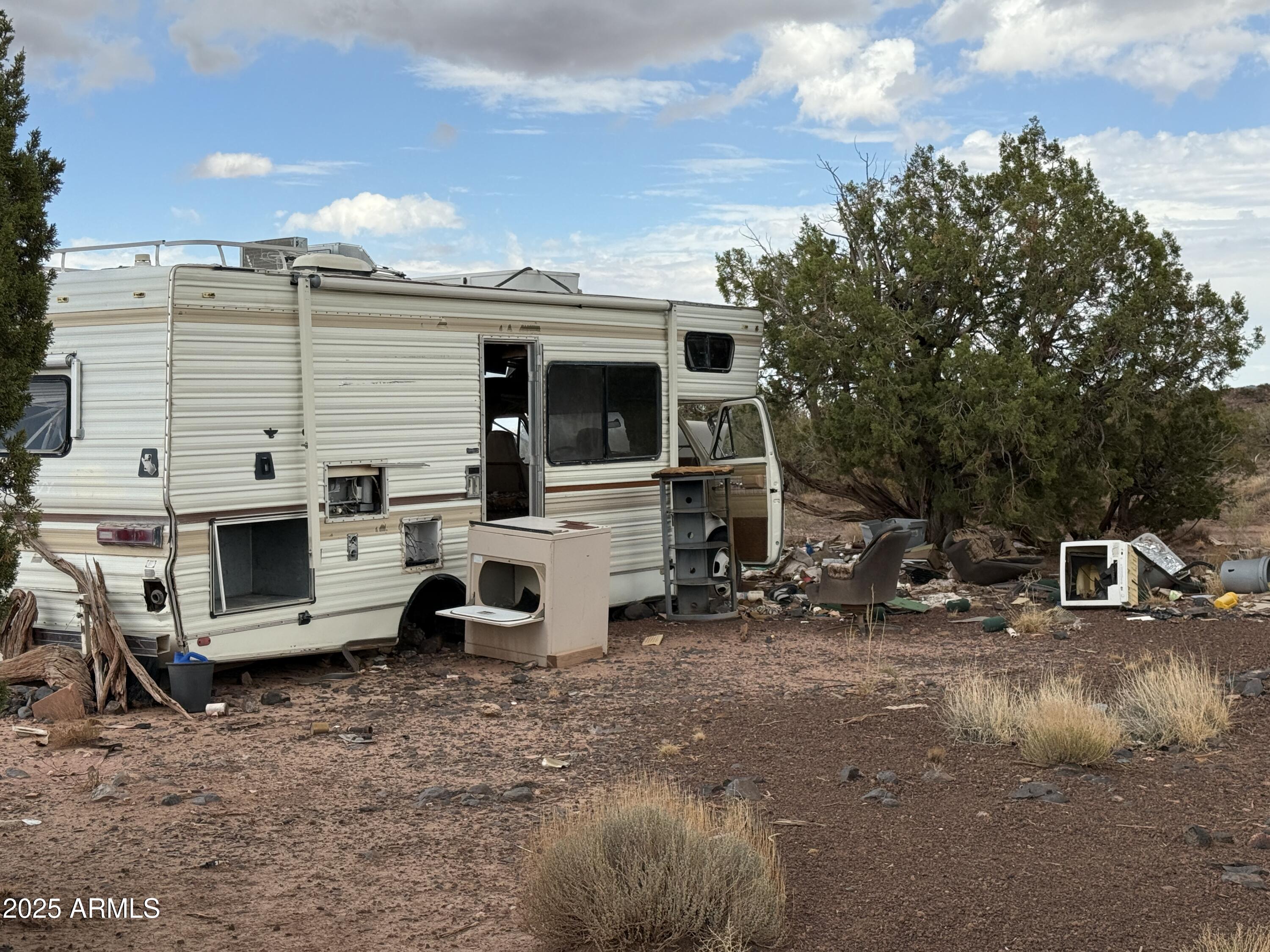 3875 Apache Road, Unit 877878 Snowflake, AZ 85937 - Photo 2 of 7 a view of a house with backyard