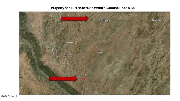 a view of a bathroom with a sink and mirror