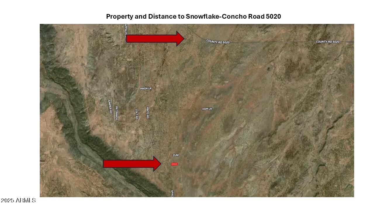 3875 Apache Road, Unit 877878 Snowflake, AZ 85937 - Photo 4 of 7 a view of a bathroom with a sink and mirror