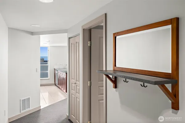 a view of a hallway with windows