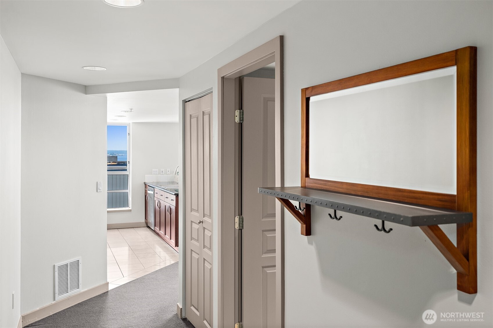 2929 1st Avenue, Unit 514 Seattle, WA 98121 - Photo 11 of 23 a view of a hallway with windows