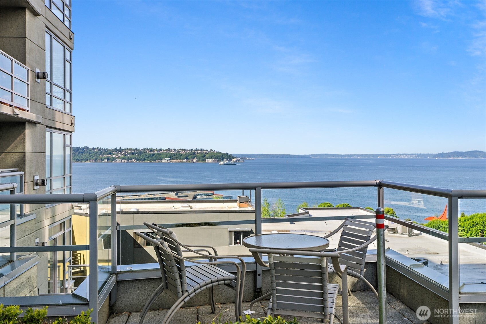 2929 1st Avenue, Unit 514 Seattle, WA 98121 - Photo 13 of 23 a view of a balcony with furniture