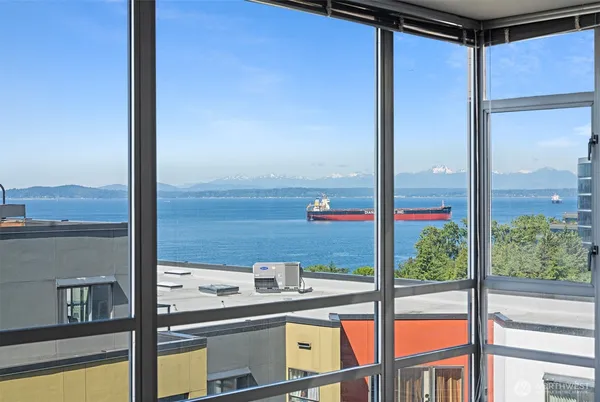 a view of a city from a living room