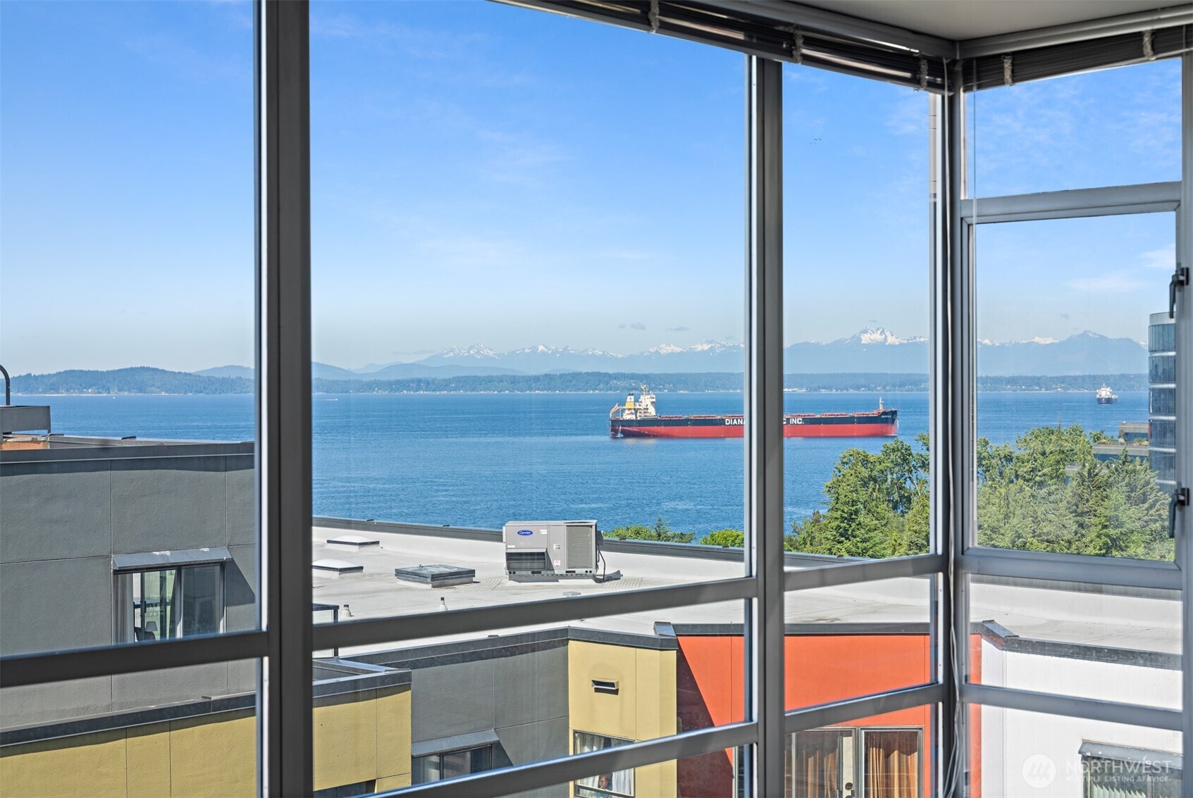 2929 1st Avenue, Unit 514 Seattle, WA 98121 - Photo 2 of 23 a view of a city from a living room