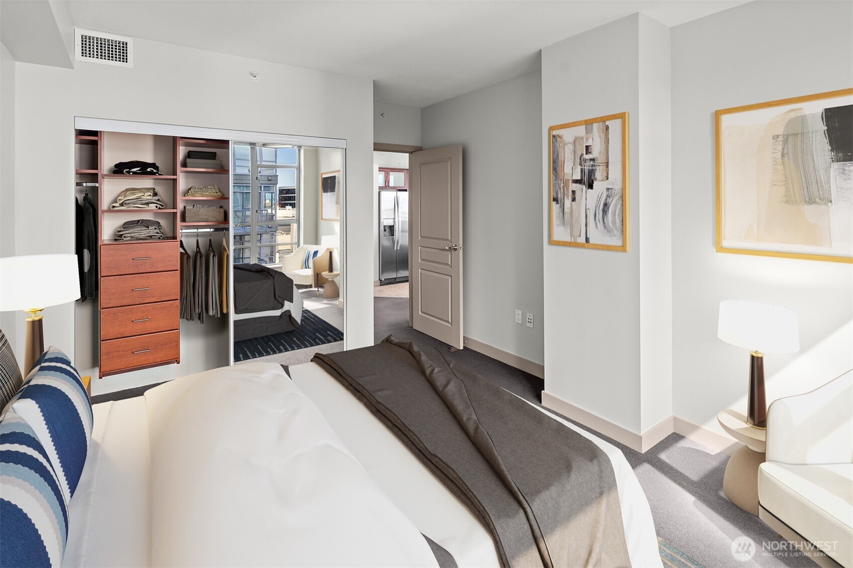2929 1st Avenue, Unit 514 Seattle, WA 98121 - Photo 9 of 23 a bedroom with a bed and a view of bedroom