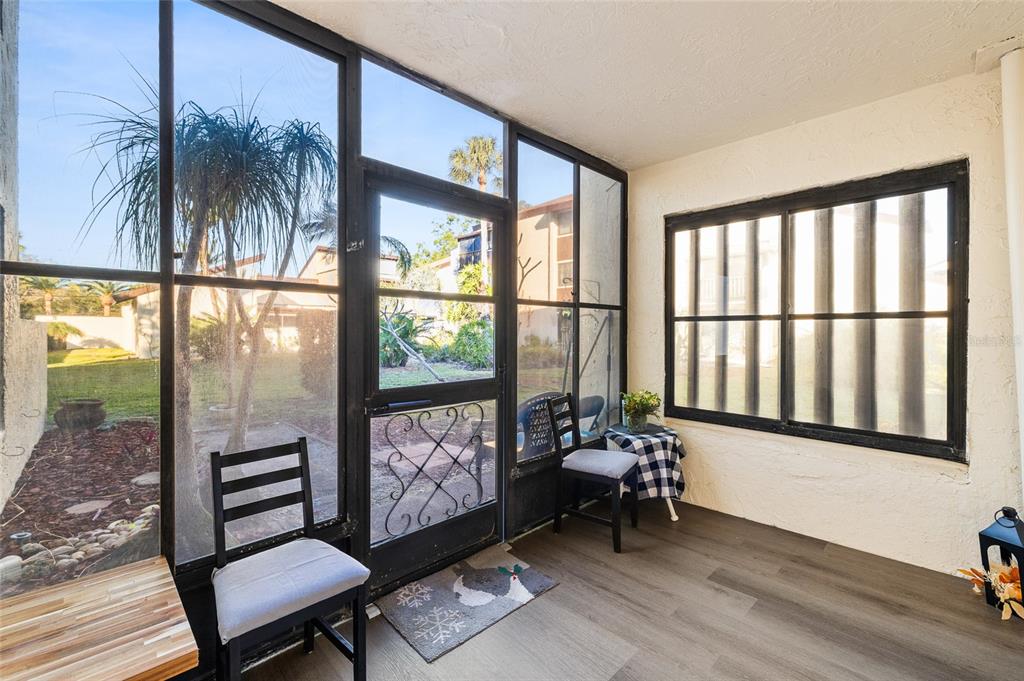 2209 Belleair Road, Unit C5 Clearwater, FL 33764 - Photo 22 of 30 a living room with furniture and a window
