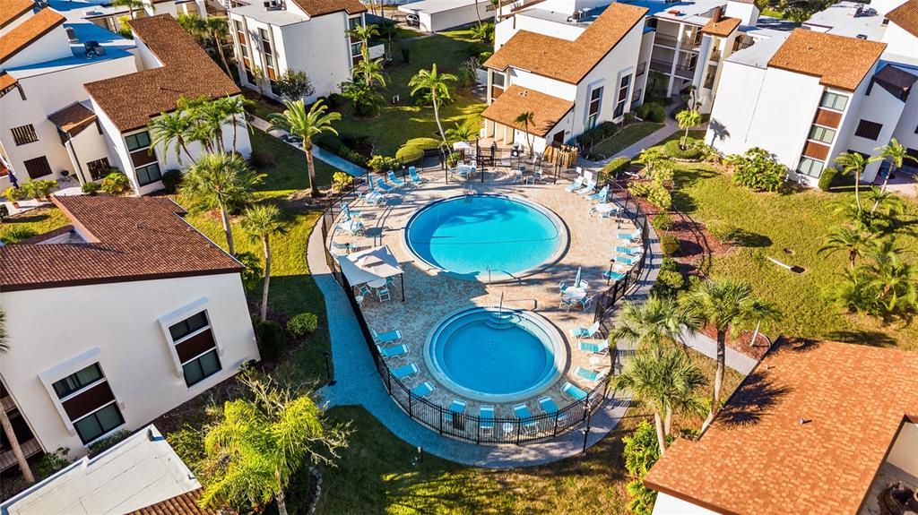 2209 Belleair Road, Unit C5 Clearwater, FL 33764 - Photo 4 of 30 a aerial view of a house with table and chairs