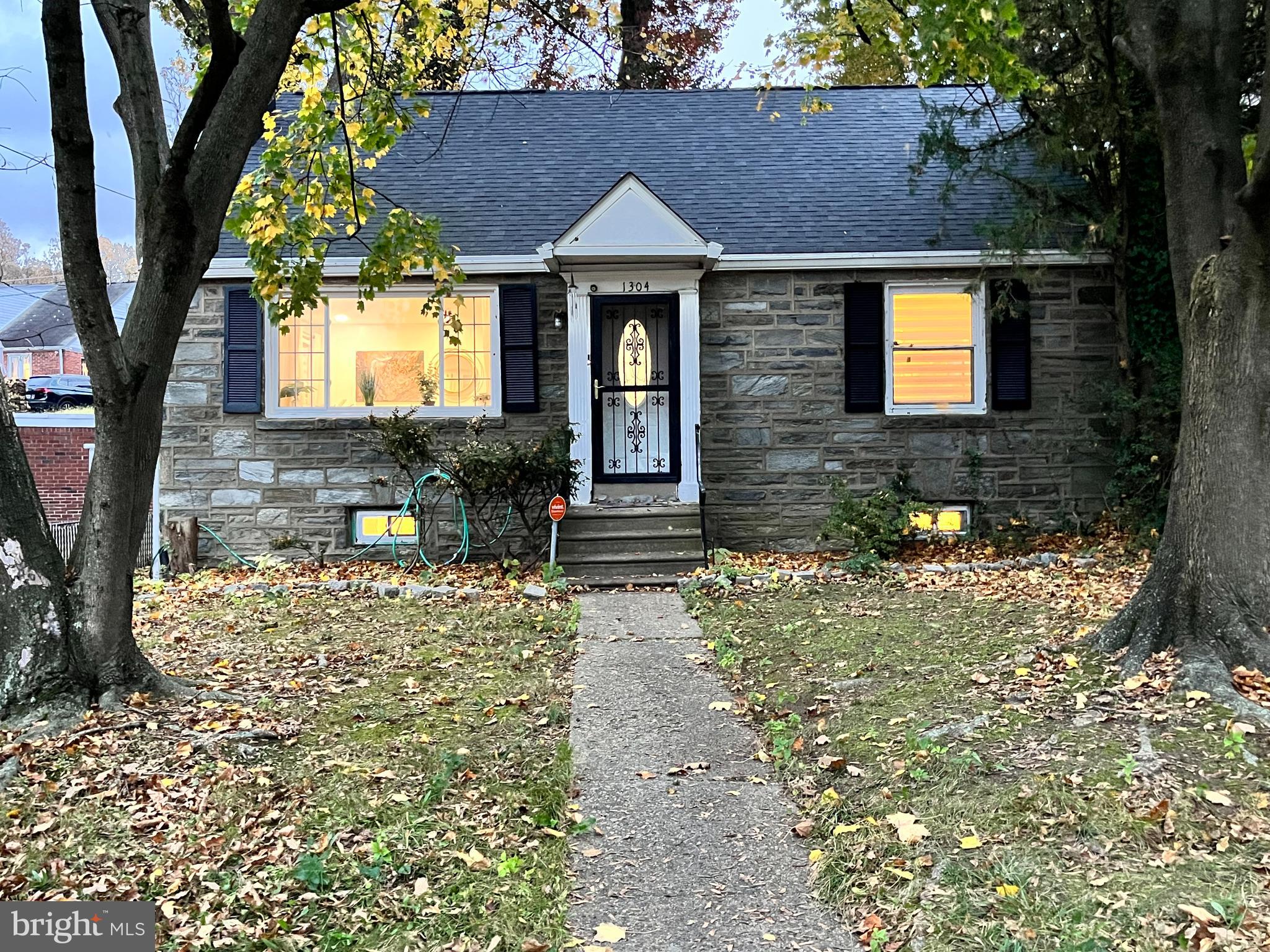 1304 Manor Road Lansdowne, PA 19050 - Photo 24 of 27 a front view of a house with yard