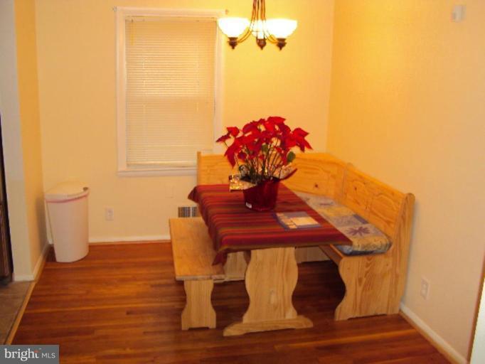 9006 Tammy Road Nottingham, MD 21236 - Photo 2 of 14 a view of balcony with wooden floor