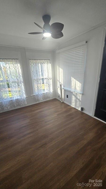 416 Oakland Road Spindale, NC 28160 - Photo 13 of 26 a view of empty room with wooden floor and fan