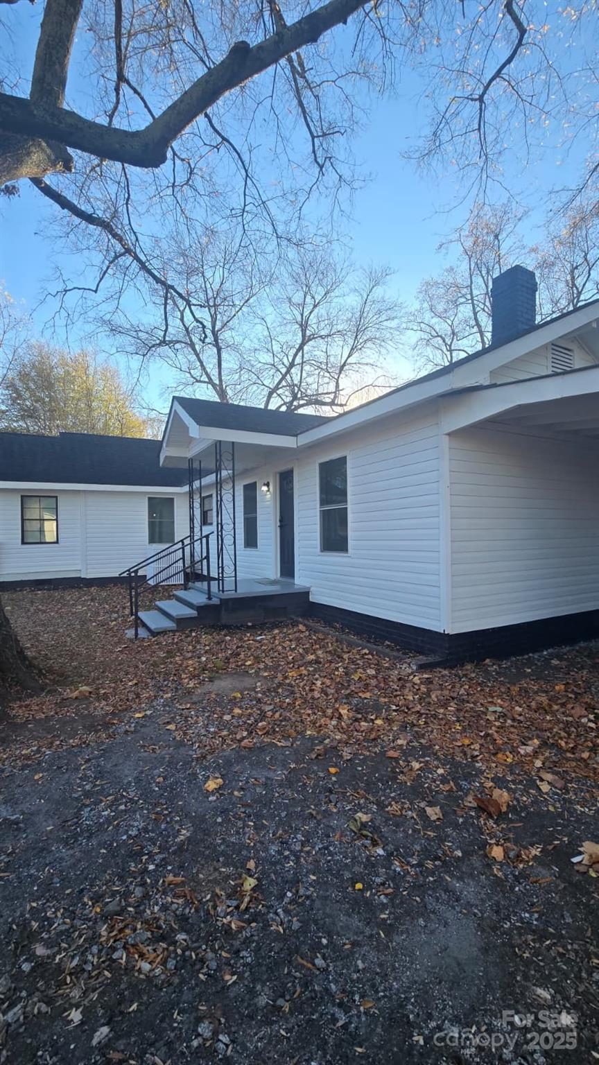416 Oakland Road Spindale, NC 28160 - Photo 22 of 26 a view of a house with a yard