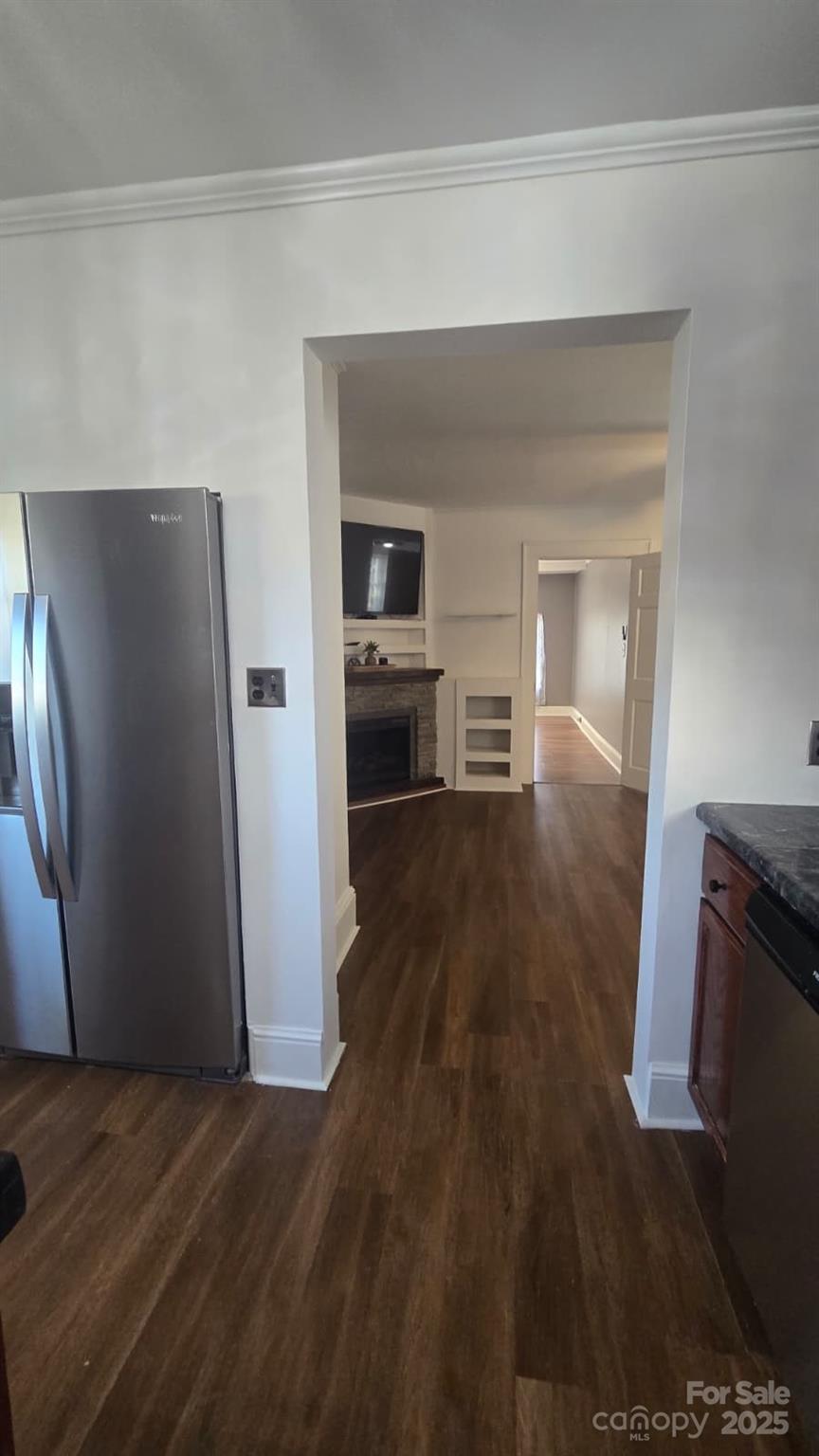 416 Oakland Road Spindale, NC 28160 - Photo 10 of 26 a view of living room and kitchen with wooden floor