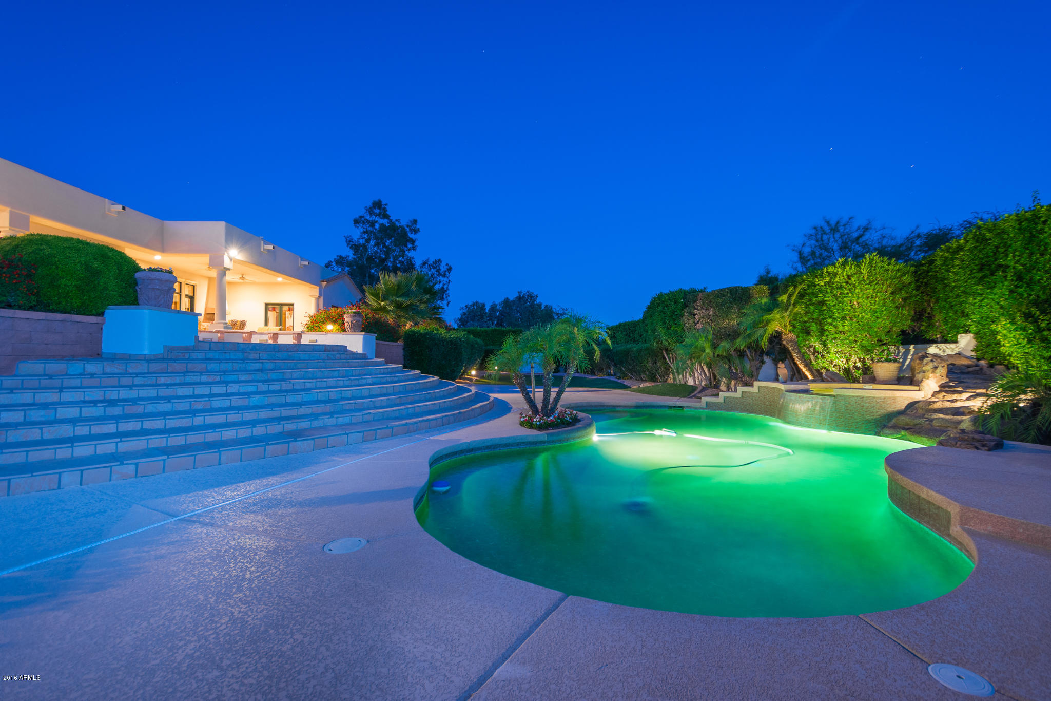 6744 North Invergordon Road Paradise Valley, AZ 85253 - Photo 46 of 59 Pool Area Twilight