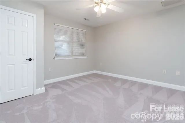 a bathroom with a shower sink and vanity