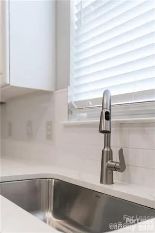 a close up of a stove top oven sitting inside of a kitchen