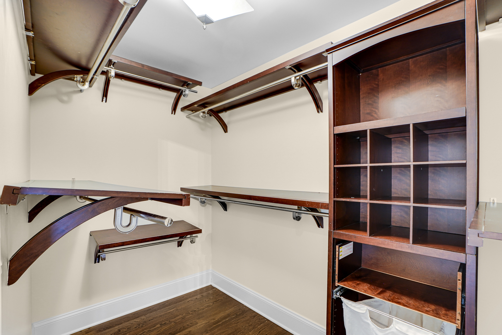 104 Moffett Road Lake Bluff, IL 60044 - Photo 14 of 40 a view of walk in closet with clothes and shoes