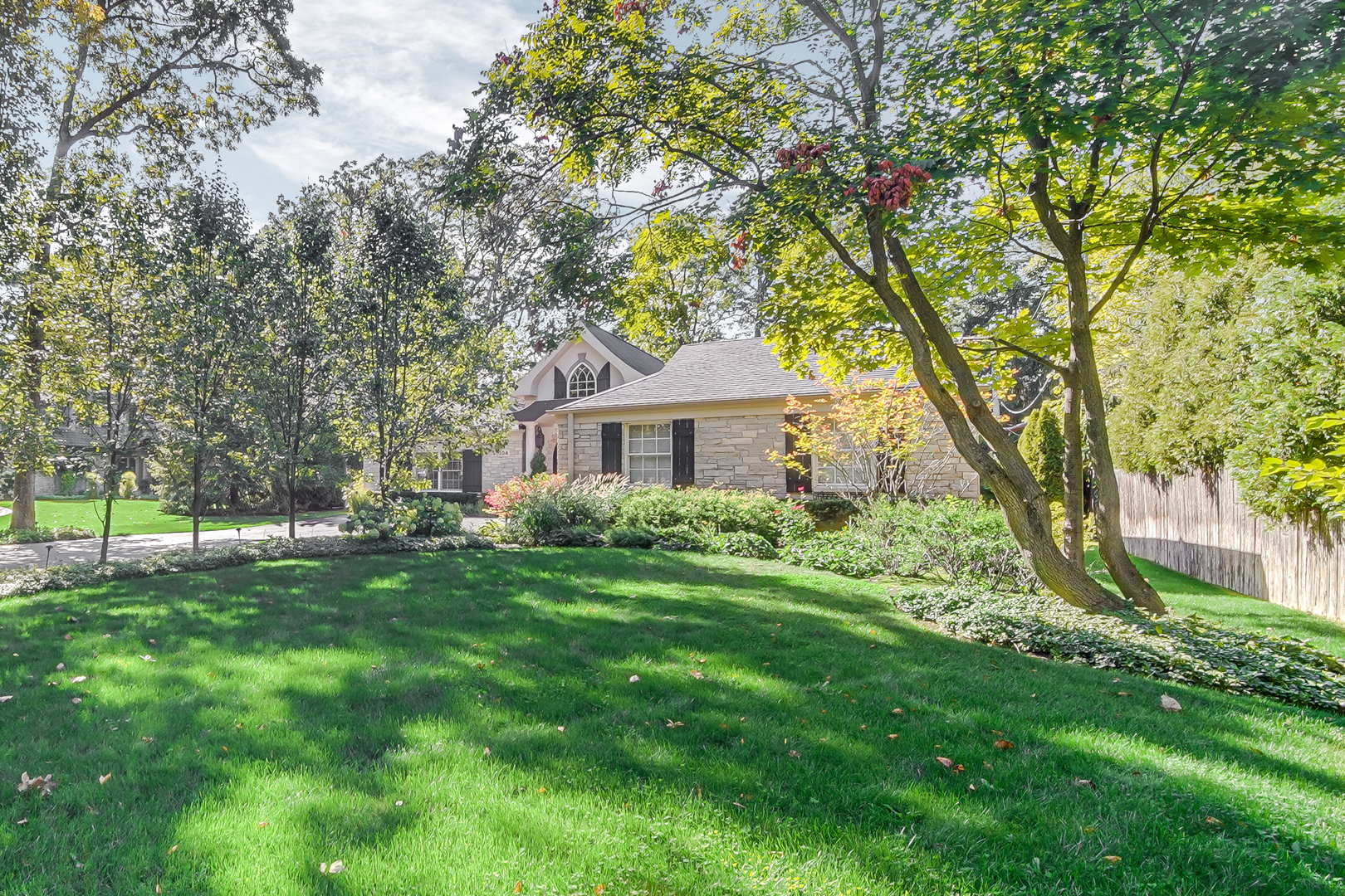 104 Moffett Road Lake Bluff, IL 60044 - Photo 2 of 40 a front view of a house with yard and green space
