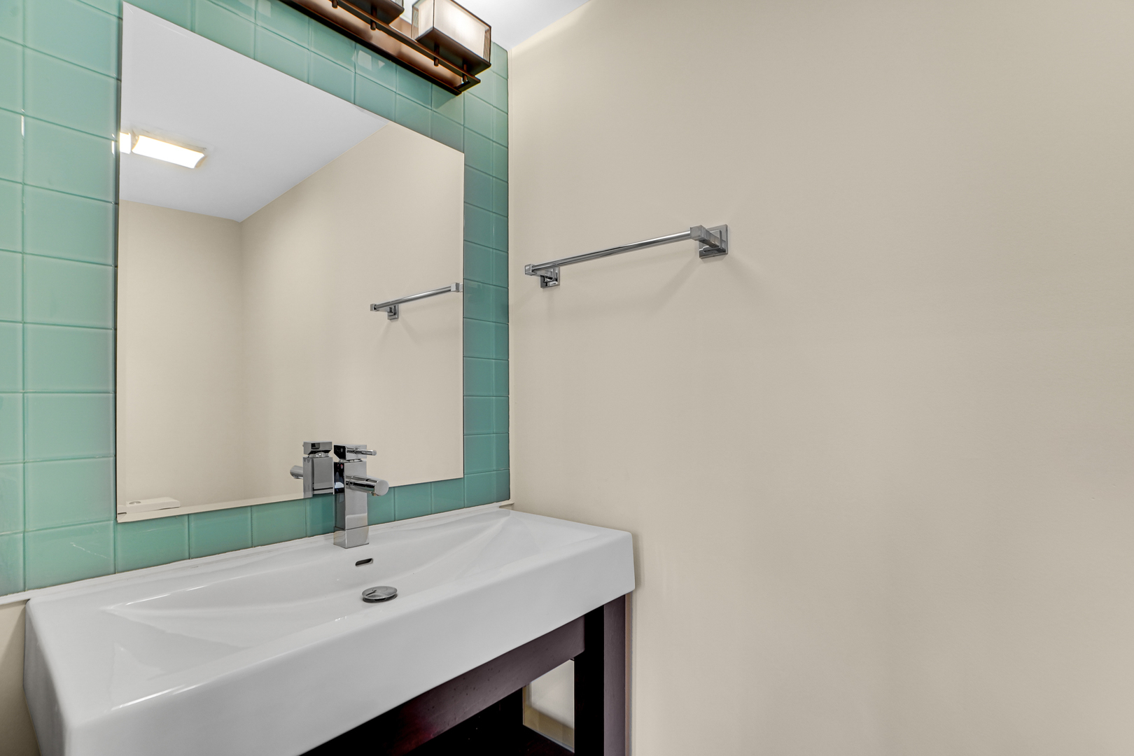 104 Moffett Road Lake Bluff, IL 60044 - Photo 21 of 40 a bathroom with a sink and a mirror