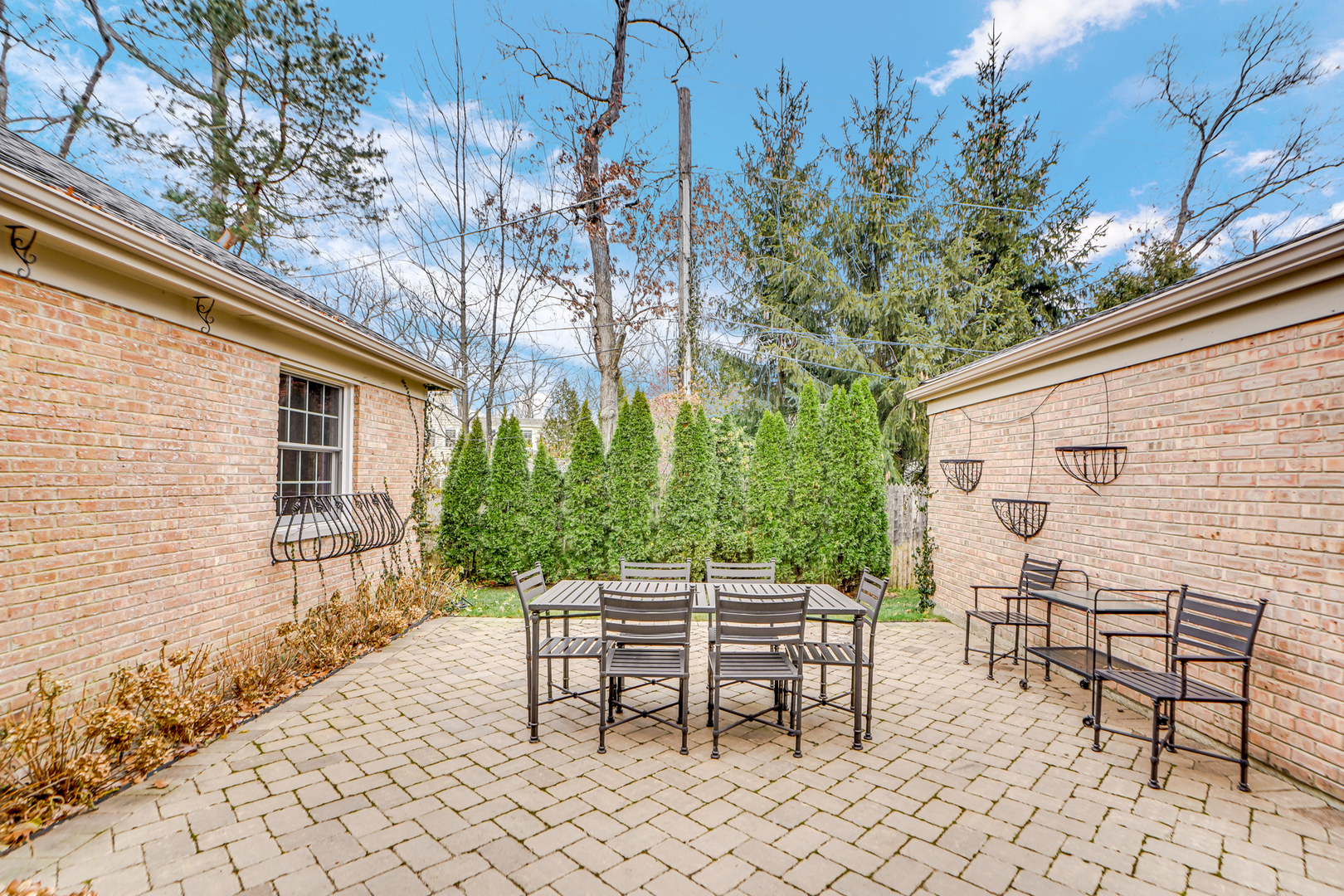 104 Moffett Road Lake Bluff, IL 60044 - Photo 24 of 40 a view of backyard with outdoor seating