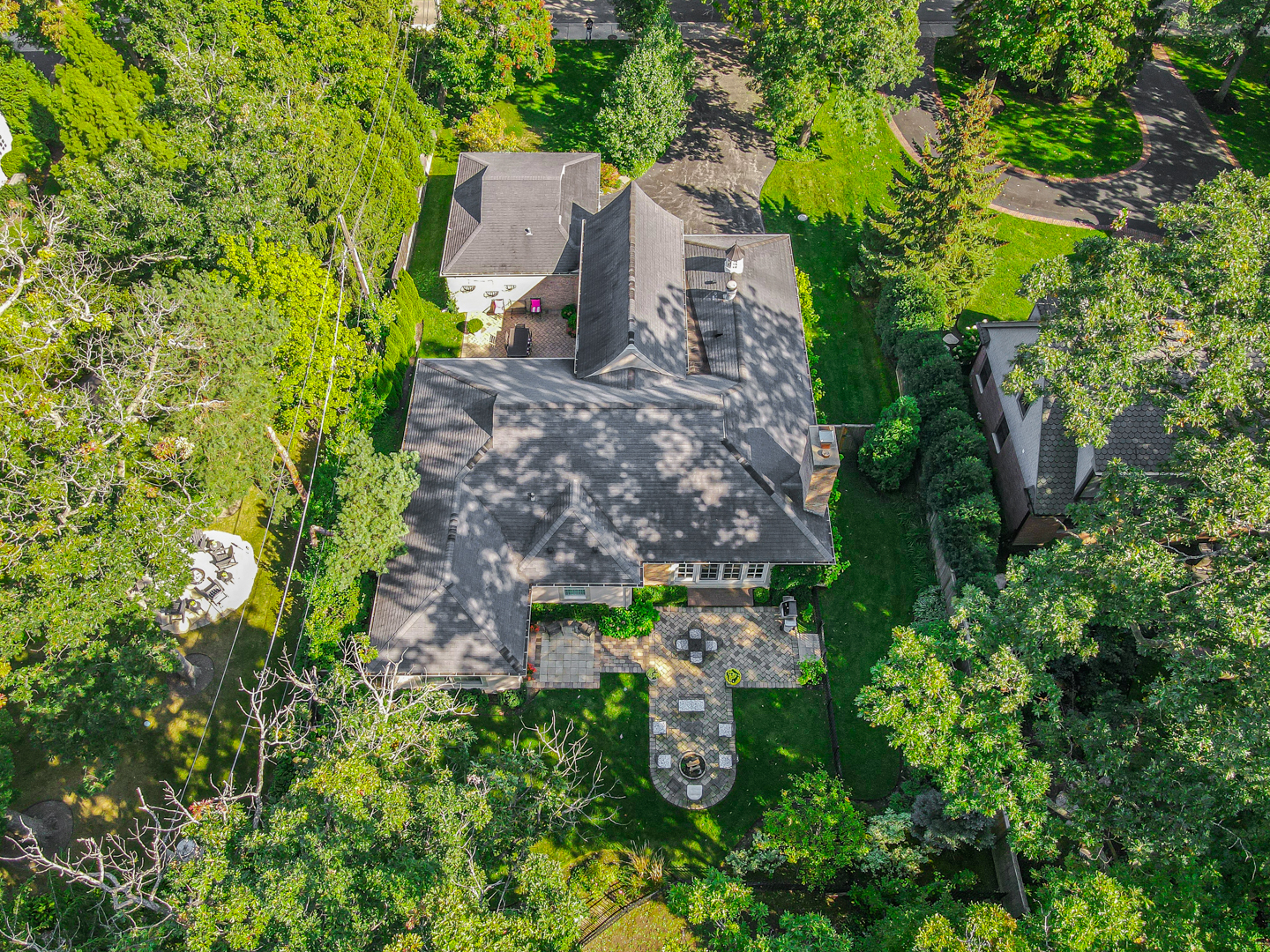 104 Moffett Road Lake Bluff, IL 60044 - Photo 31 of 40 an aerial view of a house with a yard and large trees