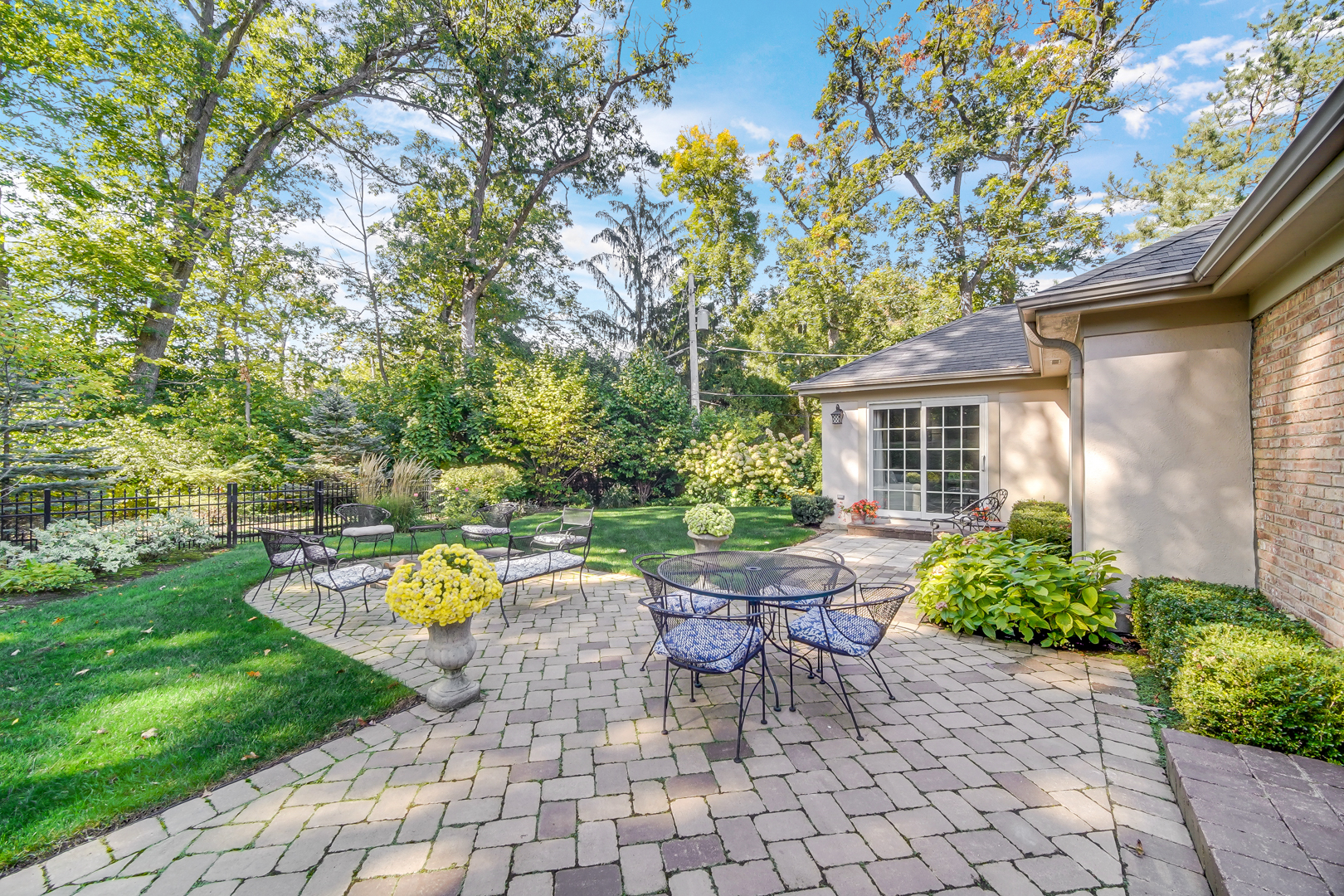 104 Moffett Road Lake Bluff, IL 60044 - Photo 36 of 40 a view of a chair and table in backyard of the house