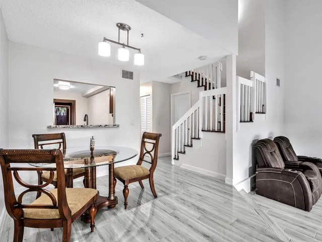 a view of a livingroom with furniture and furniture