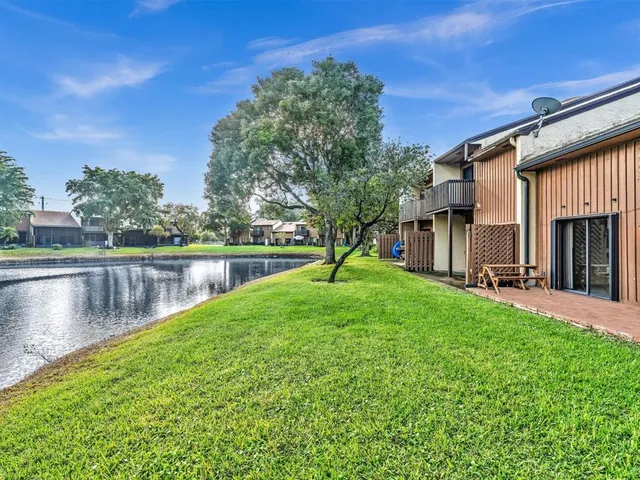 a view of a livingroom with wooden floor