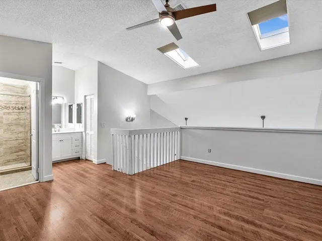 a bathroom with a sink double vanity and a mirror