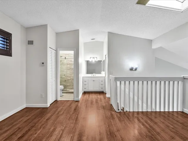 an aerial view of residential building with parking space