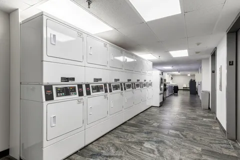 a view of a car garage with a lot of stuff