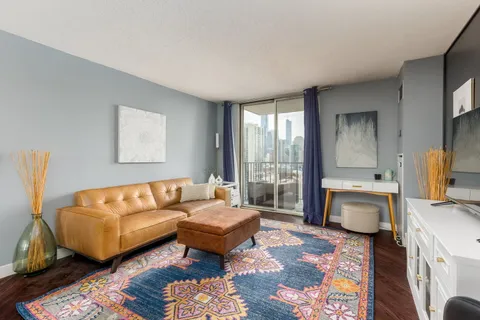 a living room with furniture and a couch