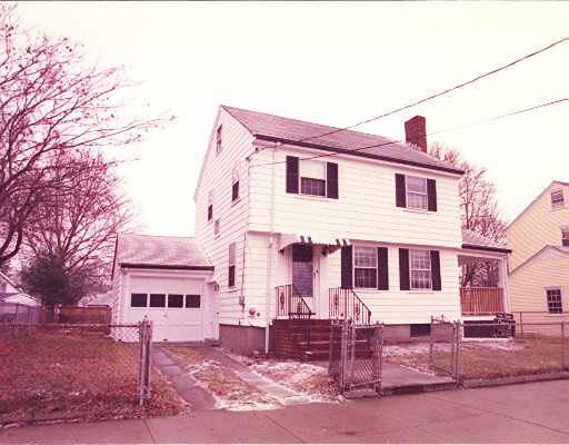 192 Spring Street Boston, MA 02132 - Photo 1 of 1 a front view of a house with street