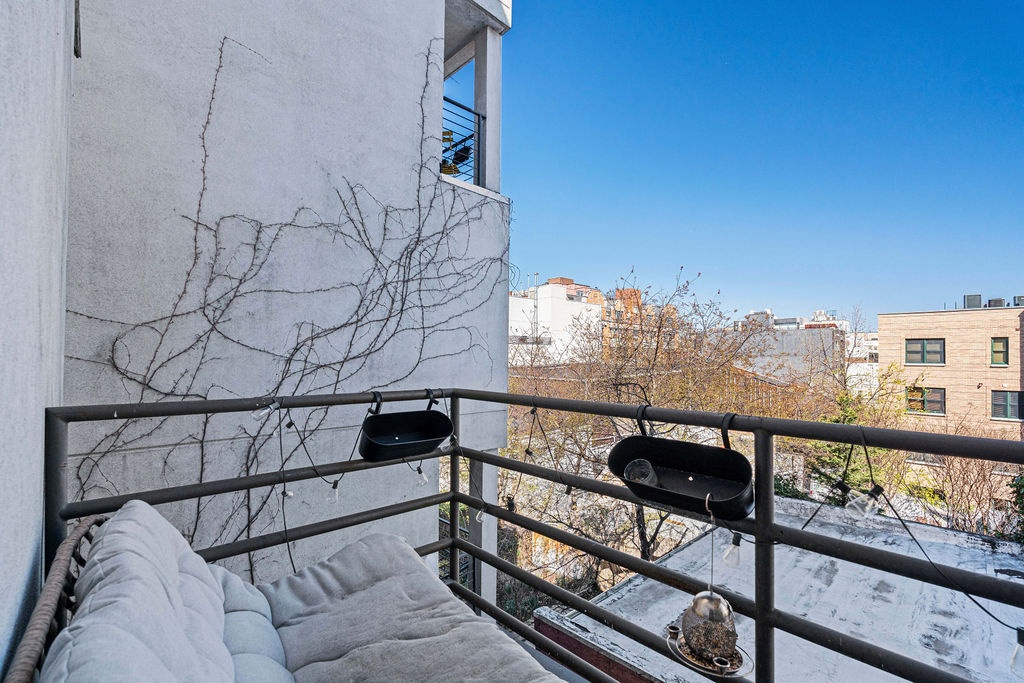 96 Woodpoint Road, Unit 3A Brooklyn, NY 11211 - Photo 6 of 12 a view of balcony with furniture