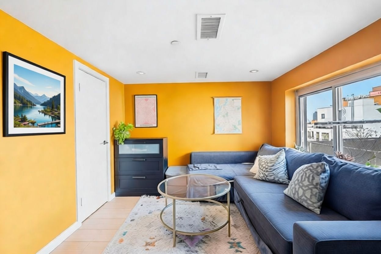 96 Woodpoint Road, Unit 3A Brooklyn, NY 11211 - Photo 8 of 12 a living room with furniture and a window