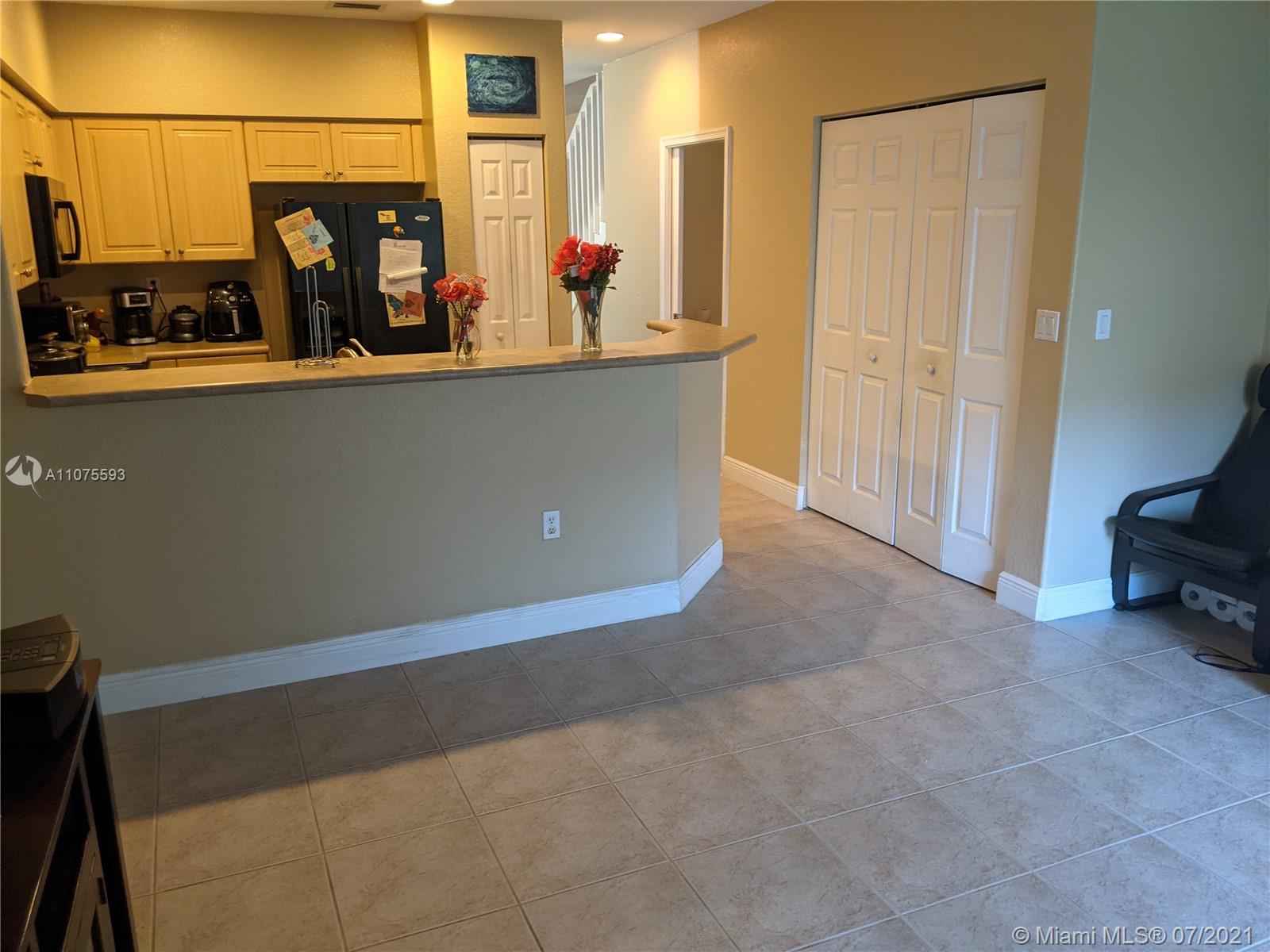 2731 Southwest 83rd Terrace, Unit 101 Miramar, FL 33025 - Photo 13 of 28 a view of a living room with closet
