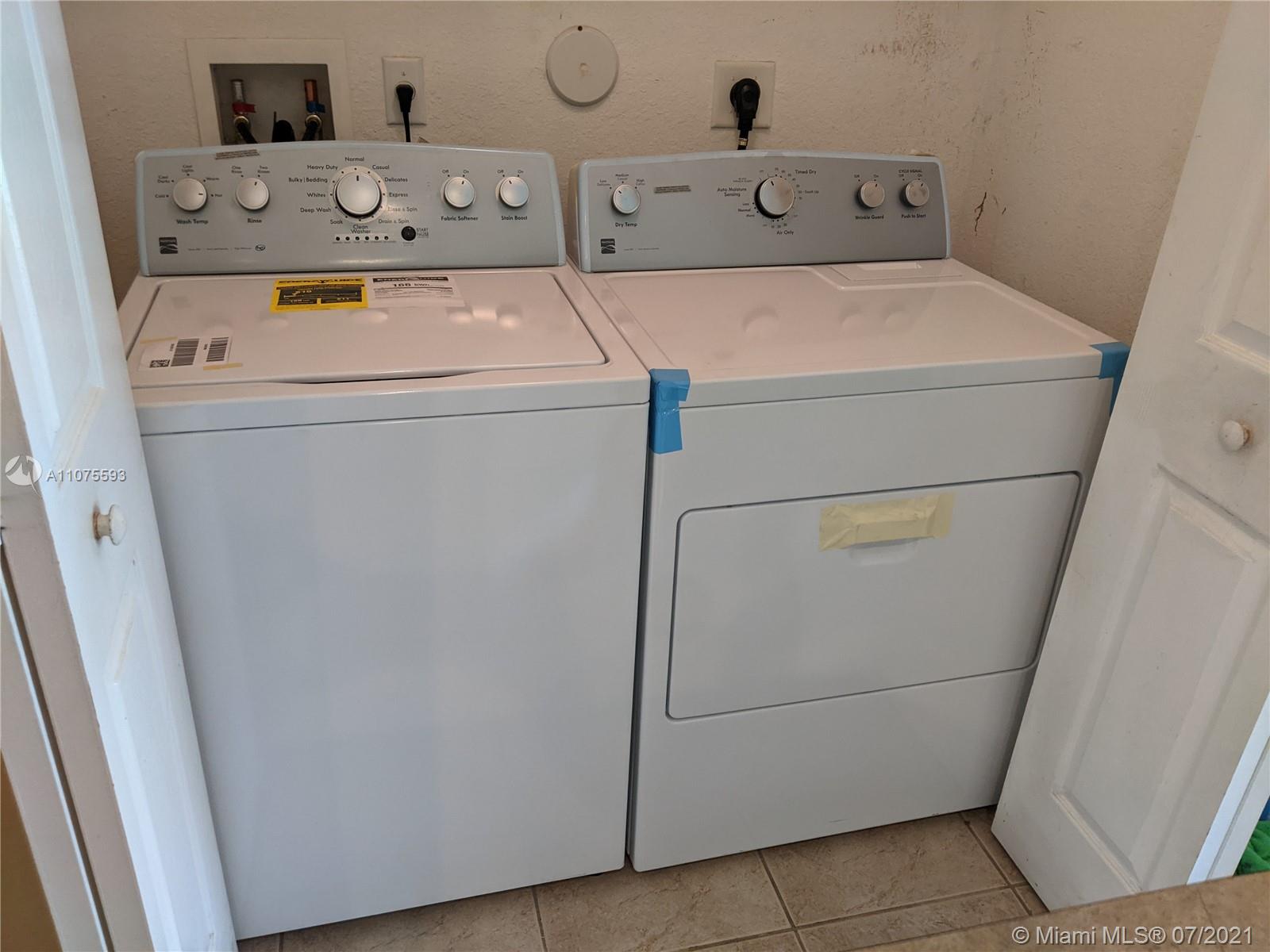 2731 Southwest 83rd Terrace, Unit 101 Miramar, FL 33025 - Photo 15 of 28 a utility room with dryer and washer