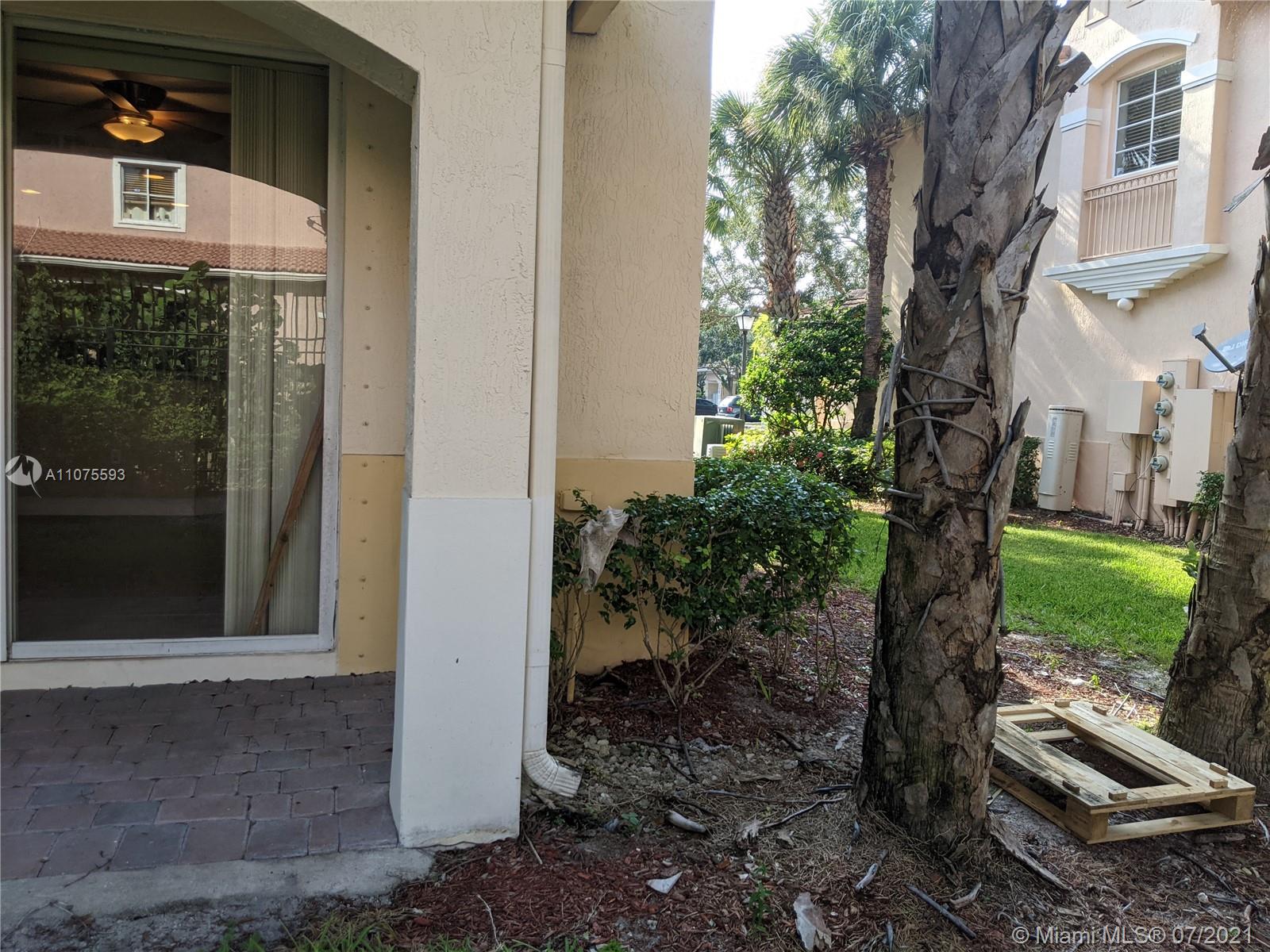 2731 Southwest 83rd Terrace, Unit 101 Miramar, FL 33025 - Photo 28 of 28 a view of a entrance gate of the house