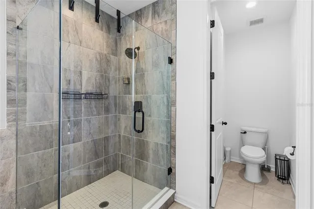 a view of a livingroom with workspace and a window