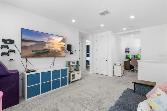 a bathroom with a sink mirror and vanity