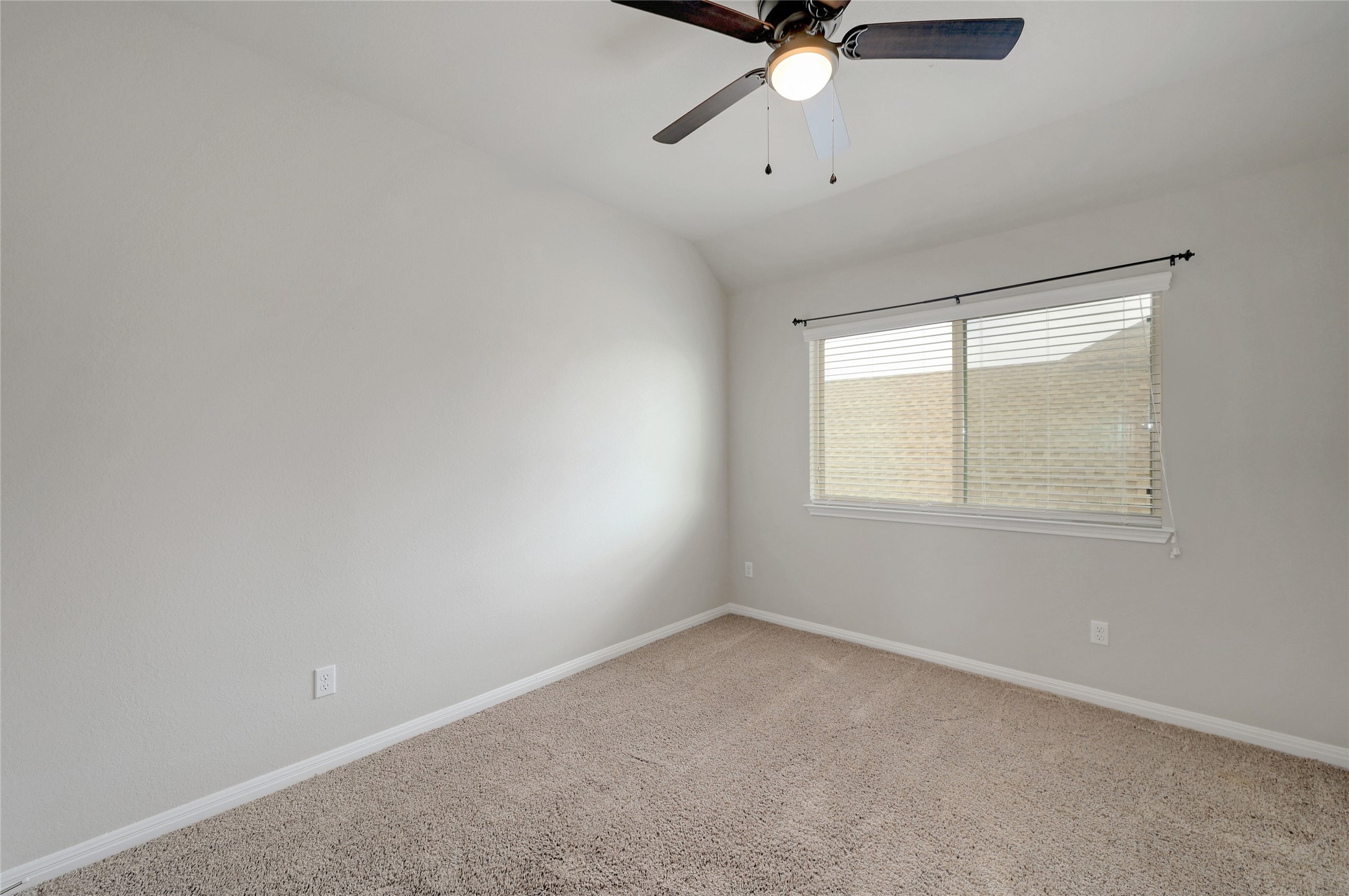 702 Nautical Loop Kyle, TX 78640 - Photo 20 of 27 Bedroom with neutral-toned walls, carpeted flooring, and a ceiling fan