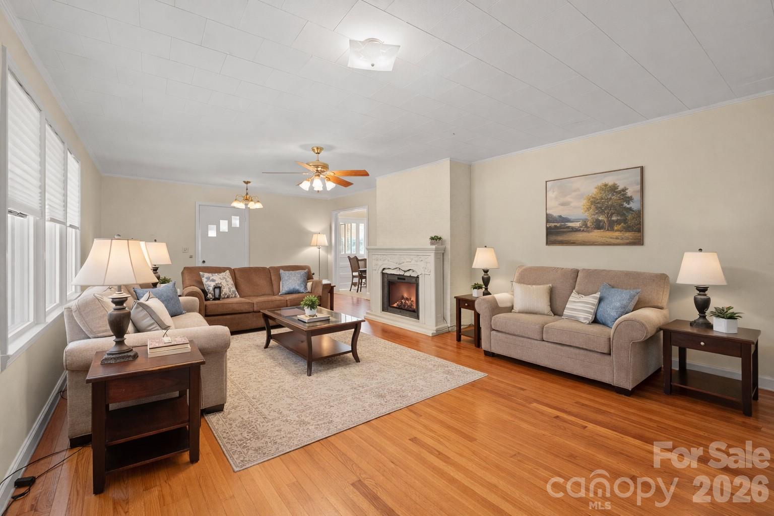 6264 Highway 221 Marion, NC 28752 - Photo 11 of 41 a living room with furniture fireplace and window