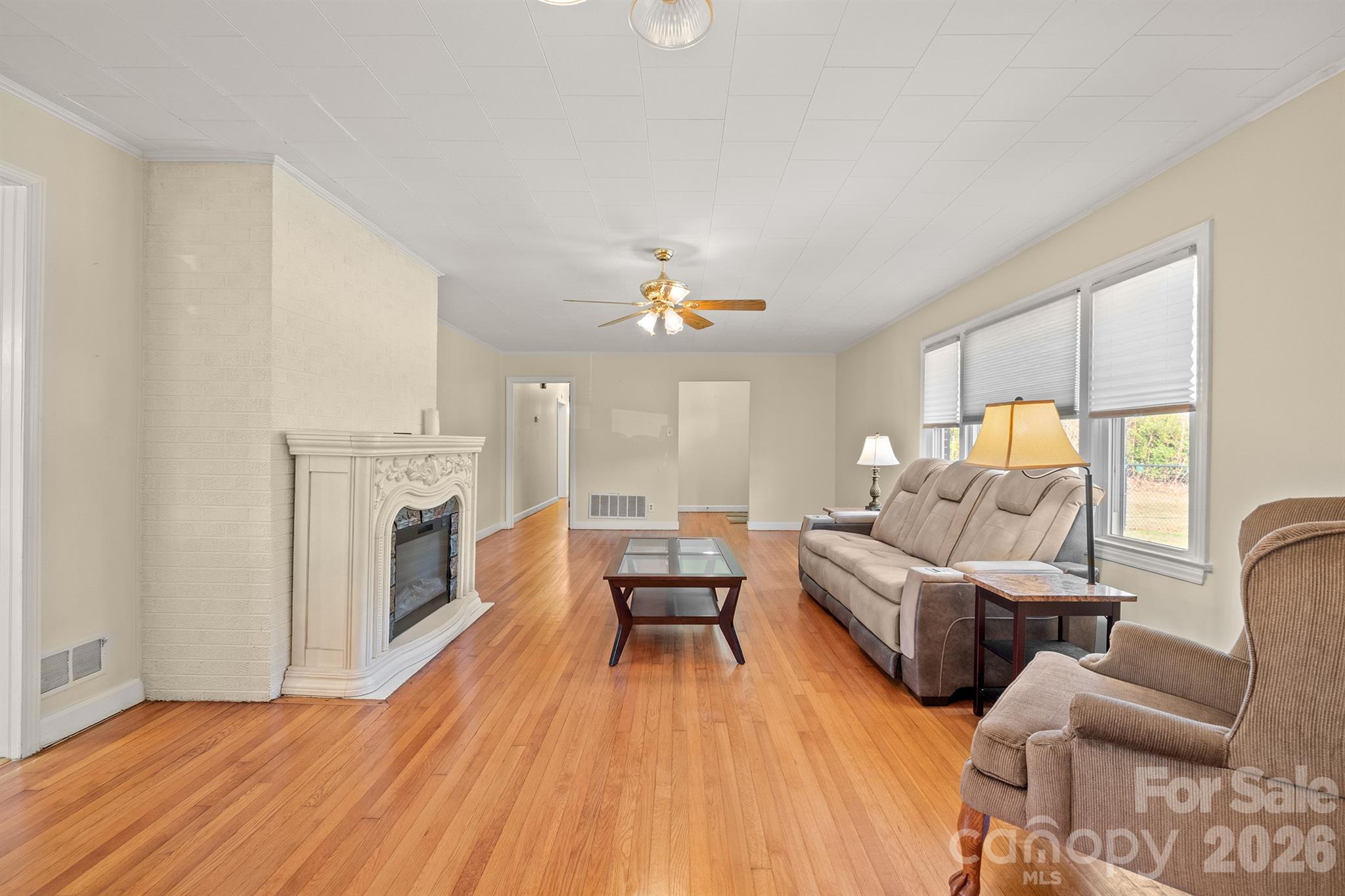 6264 Highway 221 Marion, NC 28752 - Photo 13 of 41 a living room with furniture and a fireplace