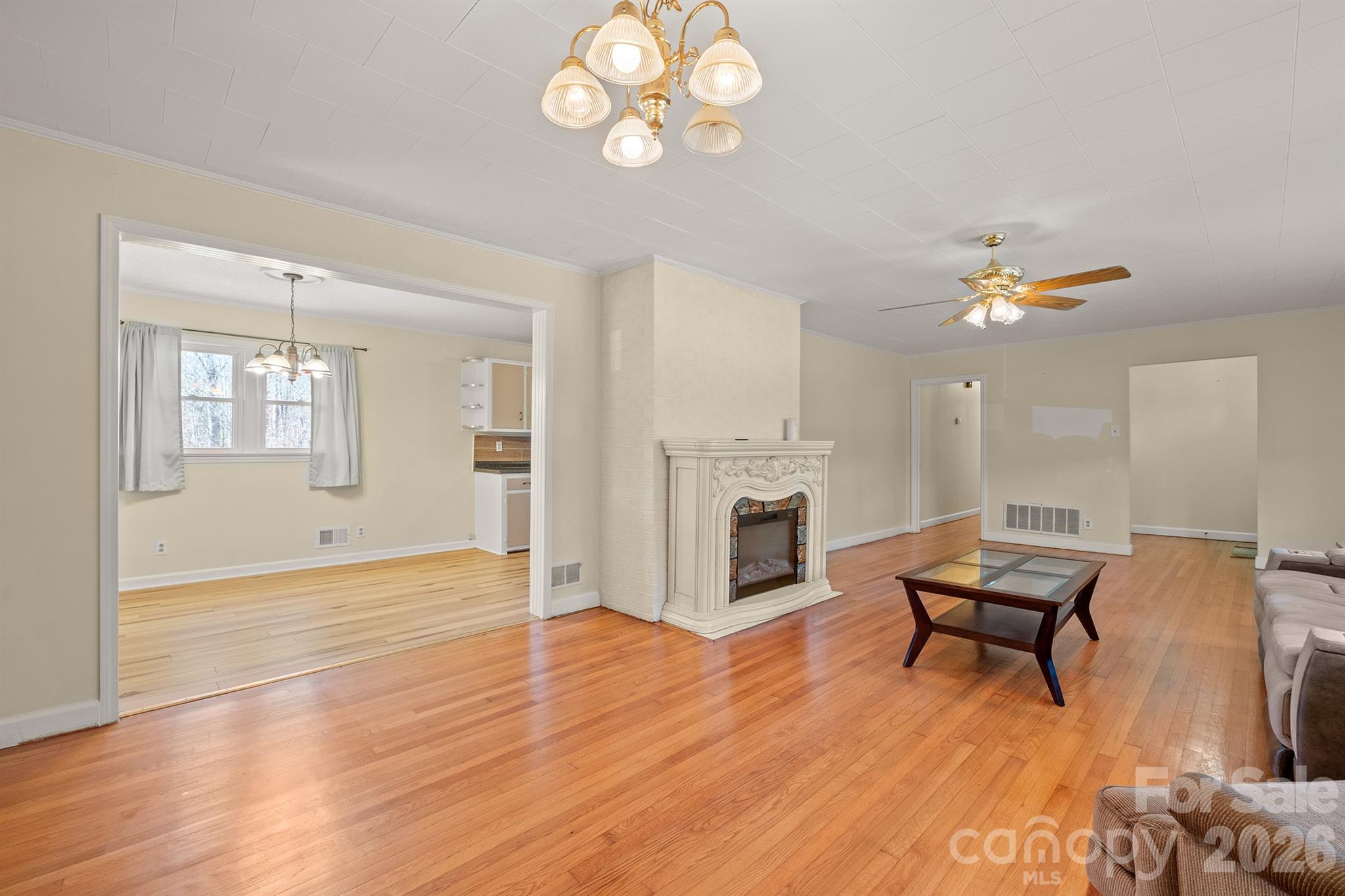 6264 Highway 221 Marion, NC 28752 - Photo 14 of 41 a view of a livingroom with furniture and wooden floor