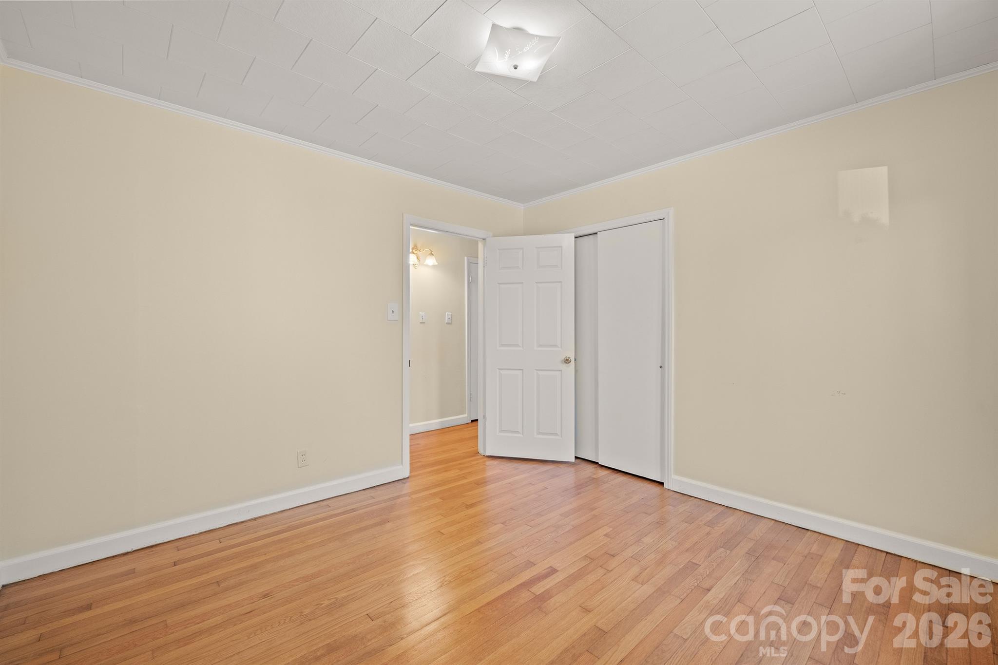 6264 Highway 221 Marion, NC 28752 - Photo 30 of 41 a view of an empty room with wooden floor