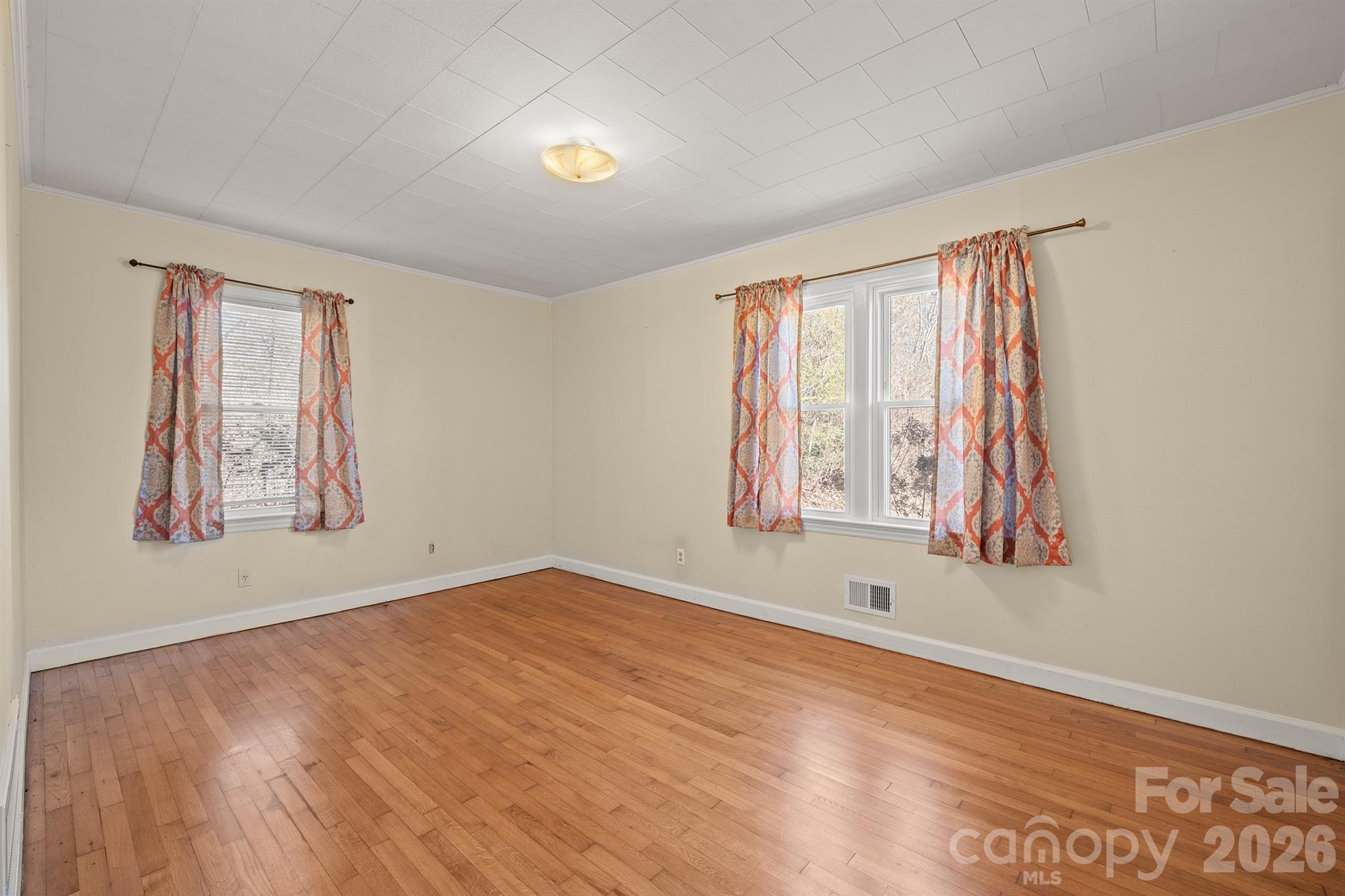 6264 Highway 221 Marion, NC 28752 - Photo 31 of 41 wooden floor in an empty room with a window
