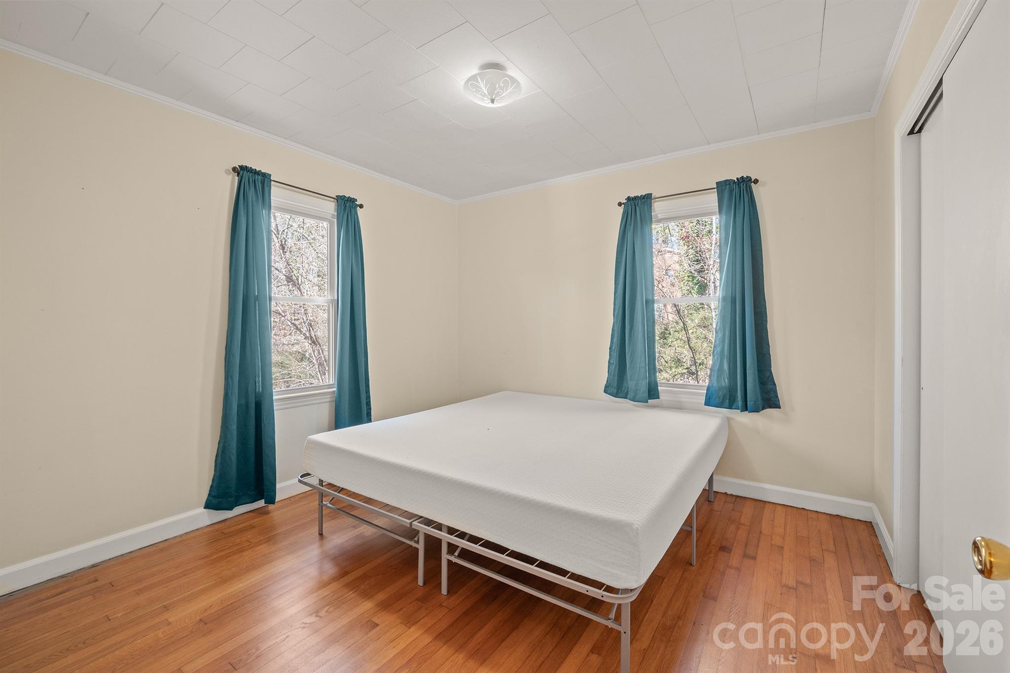 6264 Highway 221 Marion, NC 28752 - Photo 38 of 41 a workspace with wooden floor and windows