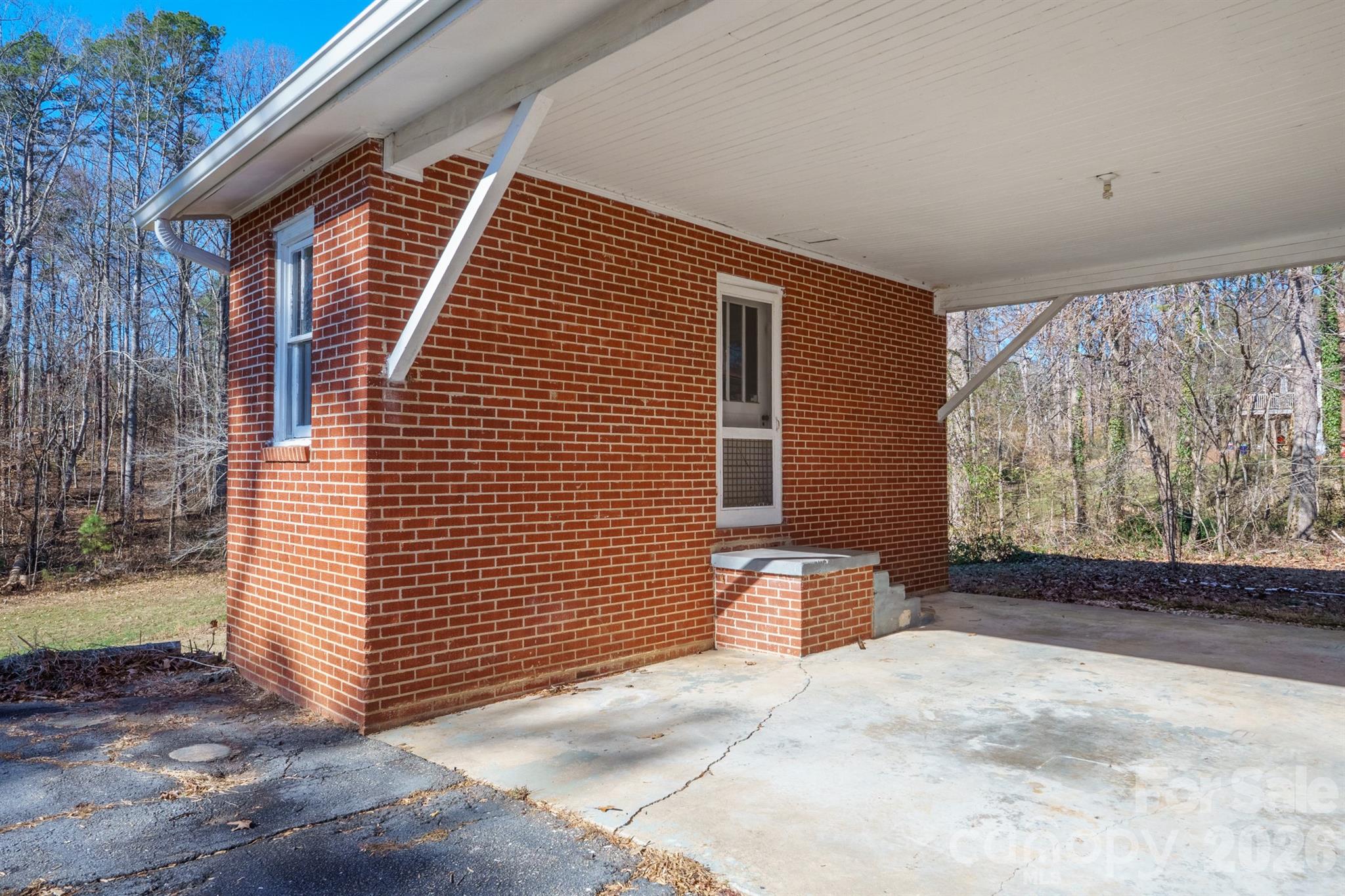 6264 Highway 221 Marion, NC 28752 - Photo 4 of 41 a view of front door and a yard