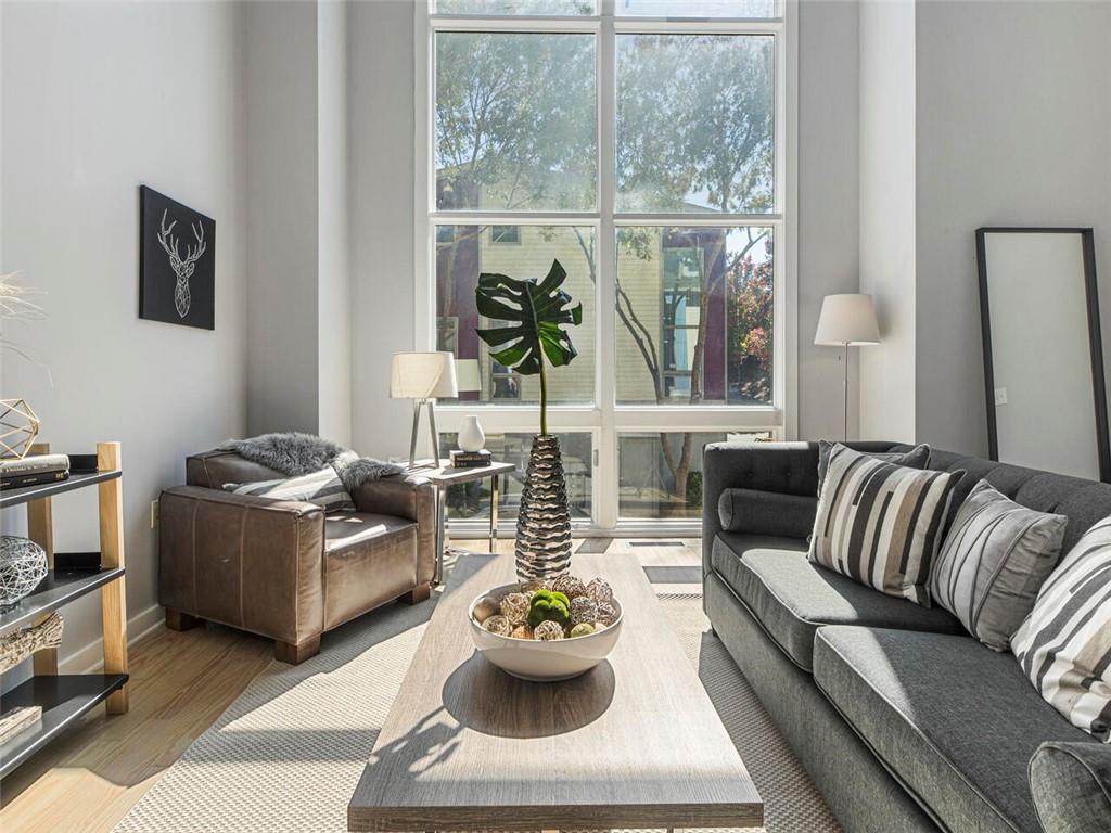 1334 Rietveld Row Northwest Atlanta, GA 30318 - Photo 1 of 1 Living room featuring light wood-type flooring